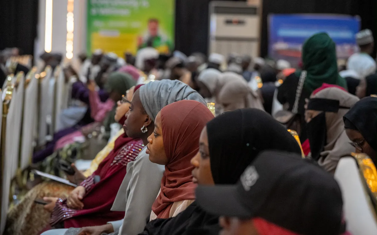 Delegates listening during a session